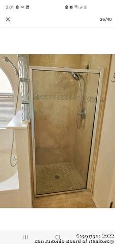 11427 Baltic Dr, San Antonio, TX 78213 - bathroom with a shower stall and a bathtub