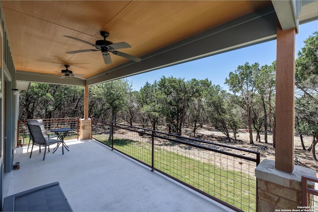 868 Lakeridge Loop, Lakehills, TX 78063 - view of patio / terrace featuring a ceiling fan and view of scattered trees