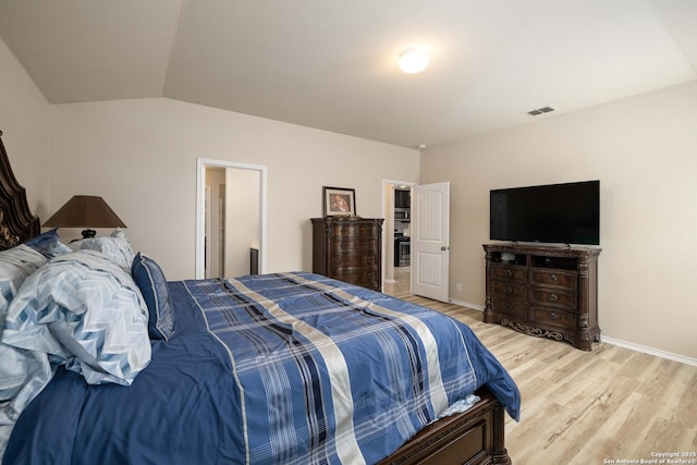 12162 Remilly Way, Schertz, TX 78154 - bedroom featuring light wood-style floors, baseboards, and vaulted ceiling