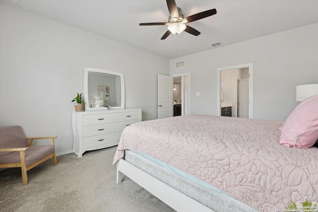 14607 Flatiron Clf, San Antonio, TX 78253 - bedroom featuring light carpet, ceiling fan, and ensuite bathroom