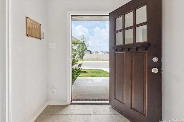 14607 Flatiron Clf, San Antonio, TX 78253 - foyer with light tile patterned floors, baseboards, and a water view