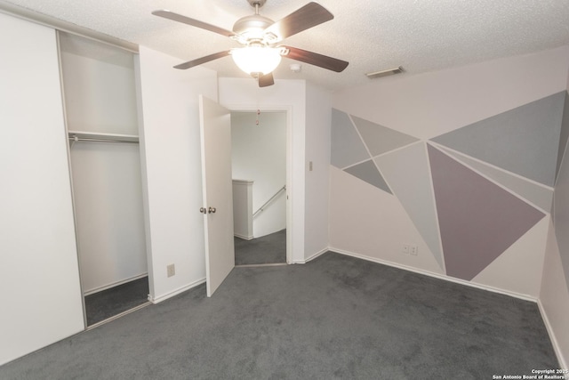 13043 Woller Crk, San Antonio, TX 78249 - unfurnished bedroom featuring carpet, a closet, a ceiling fan, and a textured ceiling