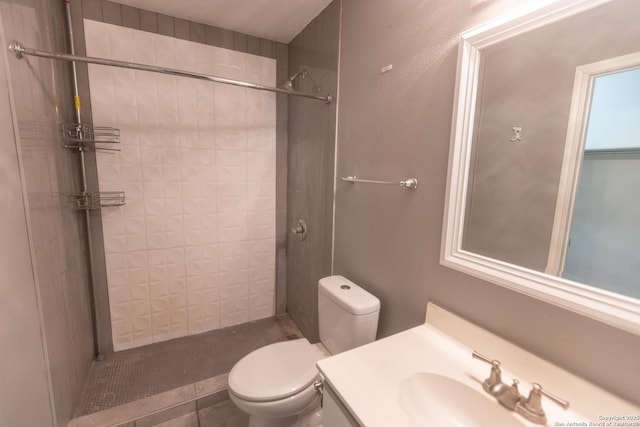 13043 Woller Crk, San Antonio, TX 78249 - full bath with toilet, vanity, a tile shower, and tile patterned flooring