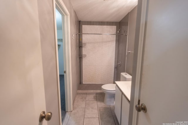 13043 Woller Crk, San Antonio, TX 78249 - full bath featuring vanity, a shower stall, toilet, and tile patterned floors