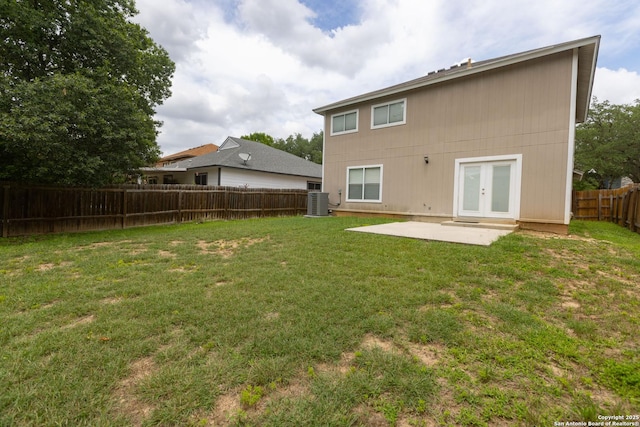 13043 Woller Crk, San Antonio, TX 78249 - rear view of house with french doors, a patio, and central AC
