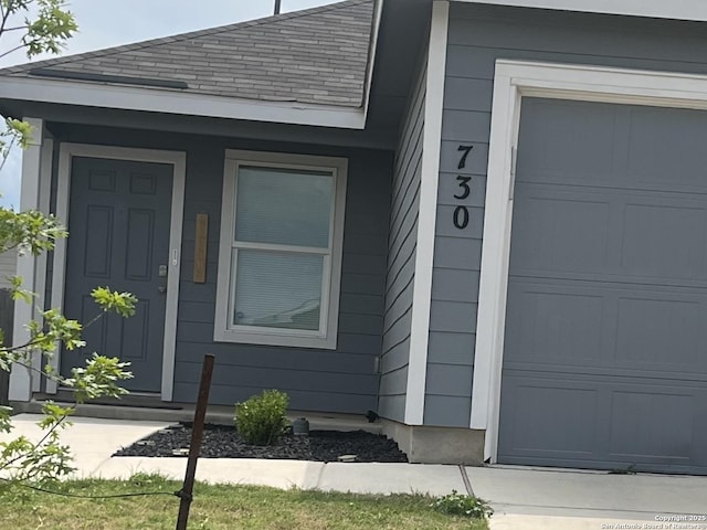 730 Tulsa Trl, New Braunfels, TX 78130 - doorway to property with an attached garage
