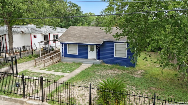 315 Morrill, San Antonio, TX 78214 - view of front of house featuring roof with shingles and a fenced front yard