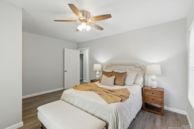 315 Morrill, San Antonio, TX 78214 - bedroom featuring baseboards, wood finished floors, and ceiling fan