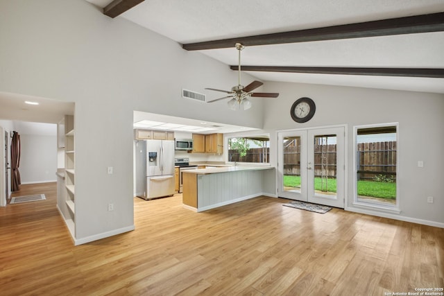 11519 Clifton Forge St, San Antonio, TX 78230 - kitchen featuring stainless steel appliances, a peninsula, light countertops, french doors, and a ceiling fan