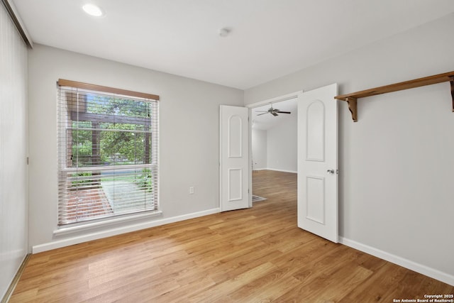 11519 Clifton Forge St, San Antonio, TX 78230 - empty room with light wood finished floors, baseboards, and recessed lighting