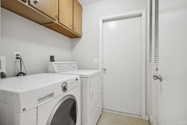 11519 Clifton Forge St, San Antonio, TX 78230 - laundry area with cabinet space, washing machine and dryer, and baseboards