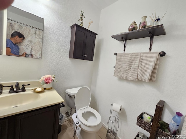 10518 Staggering, San Antonio, TX 78254 - bathroom featuring vanity, toilet, tile patterned flooring, and baseboards