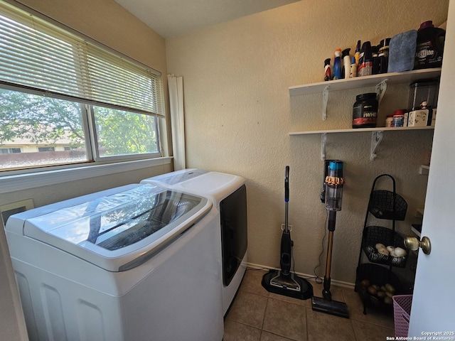 10518 Staggering, San Antonio, TX 78254 - washroom featuring washing machine and dryer, tile patterned flooring, and baseboards
