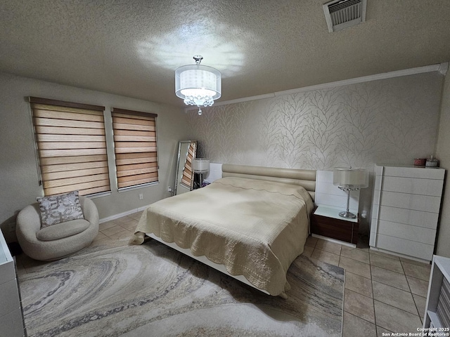 10518 Staggering, San Antonio, TX 78254 - bedroom featuring a textured ceiling, light tile patterned flooring, a chandelier, and crown molding