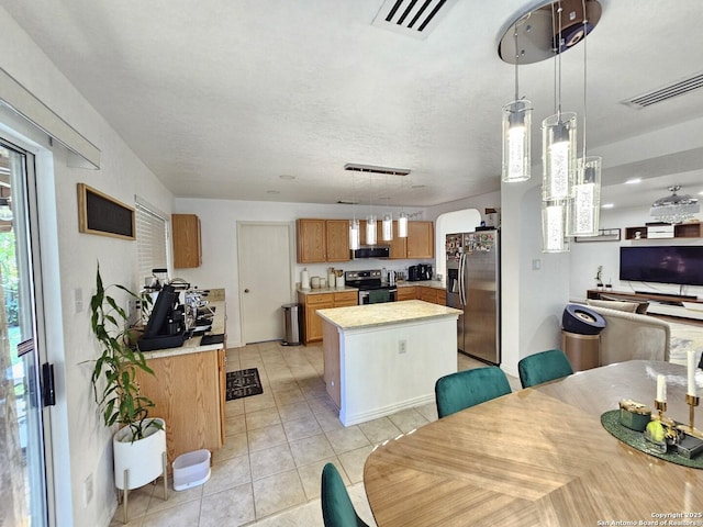 10518 Staggering, San Antonio, TX 78254 - dining room featuring light tile patterned floors and arched walkways
