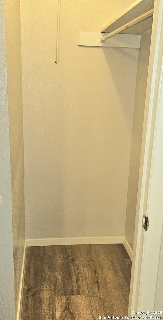 2915 Eisenhauer, San Antonio, TX 78209 - spacious closet with dark wood-style floors