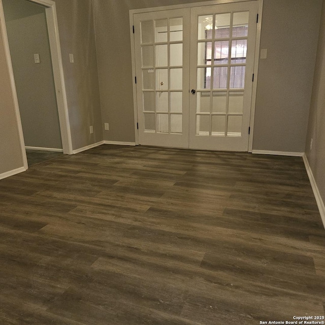 2915 Eisenhauer, San Antonio, TX 78209 - empty room featuring french doors, baseboards, and dark wood-style flooring