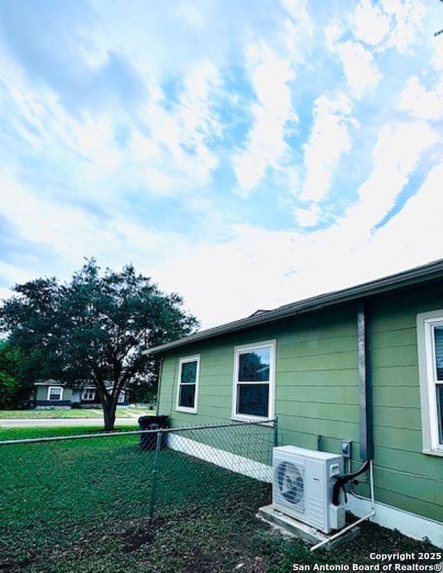 703 Mcdougal, San Antonio, TX 78223 - view of side of home featuring a cooling unit