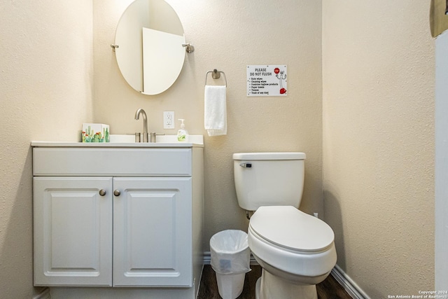 1202 N Center, San Antonio, TX 78202 - bathroom featuring vanity, toilet, and wood finished floors