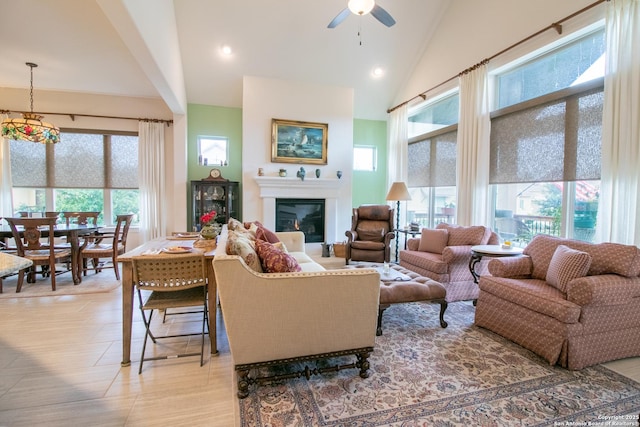 4634 Makayla Cross, San Antonio, TX 78261 - living room with ceiling fan, lofted ceiling, healthy amount of natural light, a glass covered fireplace, and recessed lighting