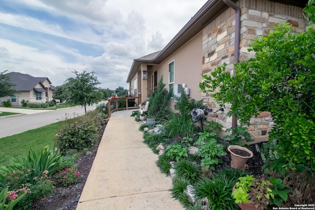 4634 Makayla Cross, San Antonio, TX 78261 - view of side of property with stucco siding