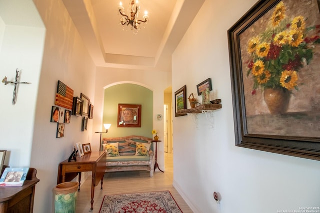4634 Makayla Cross, San Antonio, TX 78261 - corridor featuring light wood finished floors, a chandelier, and arched walkways