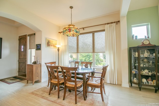 4634 Makayla Cross, San Antonio, TX 78261 - dining room with arched walkways and baseboards