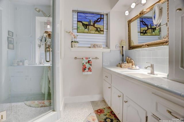 8026 Leigh, Hitchcock, TX 77563 - full bathroom with baseboards, vanity, a shower stall, and tasteful backsplash