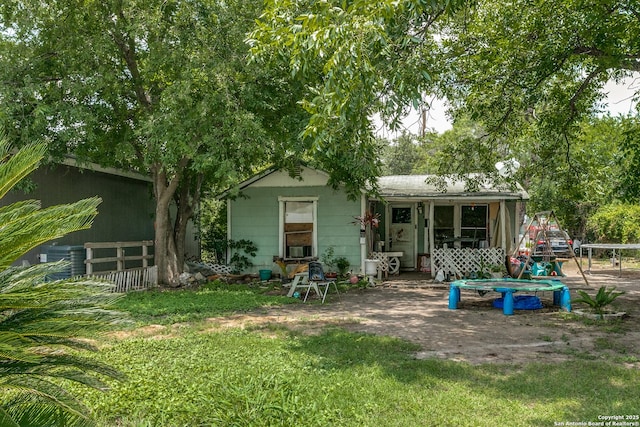 415 Wilcox Ave, San Antonio, TX 78211 - rear view of house featuring central air condition unit and a patio