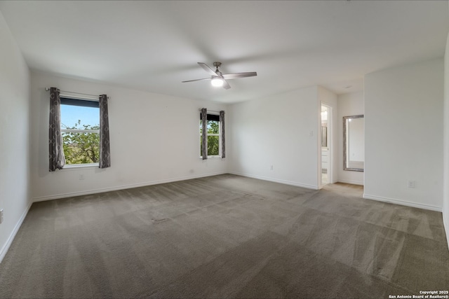 5245 Nature Path, Schertz, TX 78154 - empty room featuring healthy amount of natural light, a ceiling fan, carpet flooring, and baseboards
