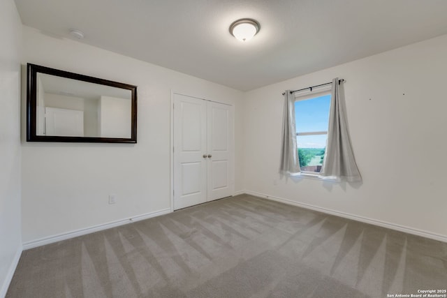 5245 Nature Path, Schertz, TX 78154 - unfurnished bedroom with carpet floors, baseboards, and a closet