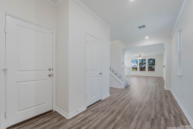 5245 Nature Path, Schertz, TX 78154 - entryway featuring wood finished floors, stairway, baseboards, crown molding, and recessed lighting