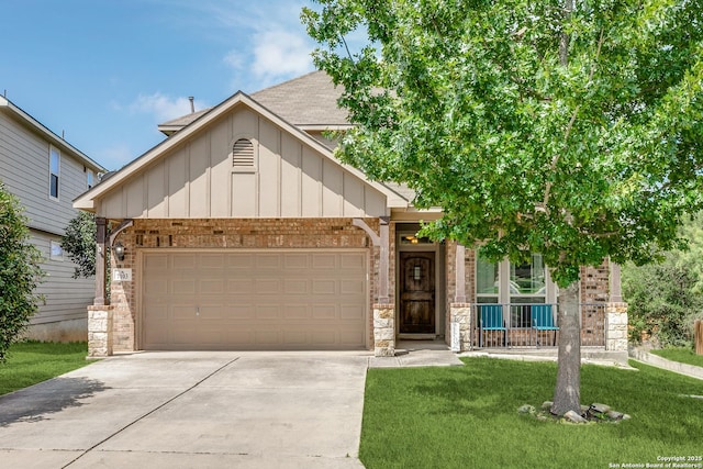 7103 Republic Pkwy, San Antonio, TX 78223 - view of front of property with board and batten siding, concrete driveway, brick siding, a front lawn, and a garage