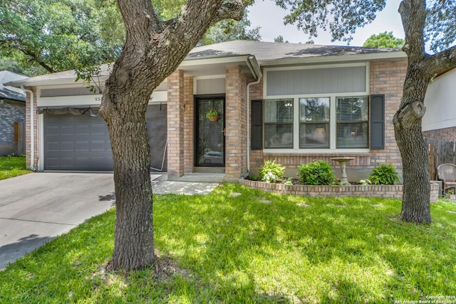 9515 Wicklow, San Antonio, TX 78250 - view of front of property with brick siding, concrete driveway, an attached garage, a front yard, and roof with shingles
