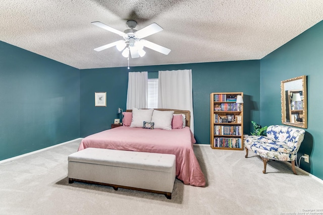 9515 Wicklow, San Antonio, TX 78250 - carpeted bedroom with a textured ceiling and a ceiling fan