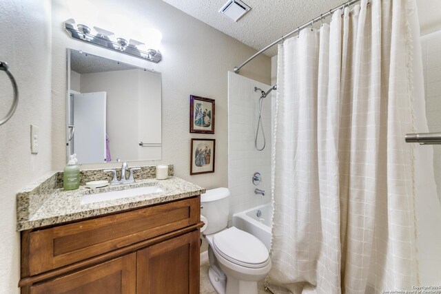 9515 Wicklow, San Antonio, TX 78250 - bathroom with a textured ceiling, toilet, vanity, and shower / bath combination with curtain