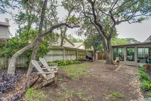 9515 Wicklow, San Antonio, TX 78250 - fenced backyard with a sunroom