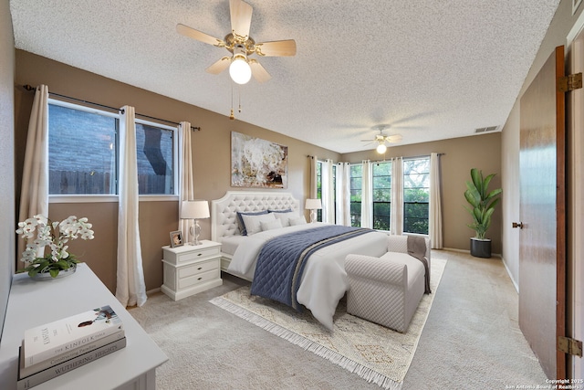 2822 Low Oak, San Antonio, TX 78232 - bedroom with a textured ceiling, light colored carpet, and a ceiling fan