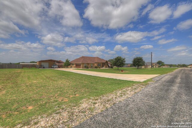 108 Westfield Ln, Vernia, TX 78121 - view of yard with concrete driveway