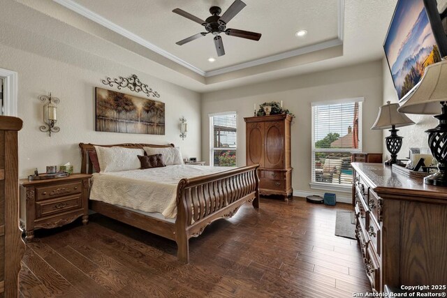 108 Westfield Ln, Vernia, TX 78121 - bedroom with a raised ceiling, ornamental molding, dark wood-style flooring, recessed lighting, and ceiling fan