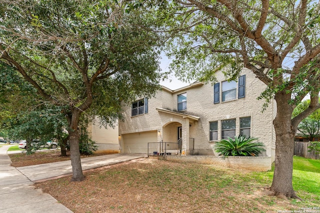 6743 Spearwood, Live Oak, TX 78233 - view of front of property featuring an attached garage and concrete driveway