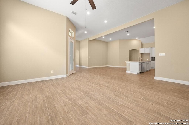 147 Bedingfeld, Shavano Park, TX 78231 - unfurnished living room with a ceiling fan, light wood-type flooring, baseboards, and recessed lighting