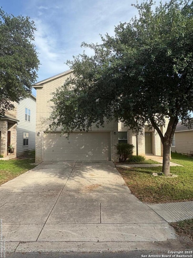 1230 Range Fld, San Antonio, TX 78245 - obstructed view of property with concrete driveway, brick siding, and a garage
