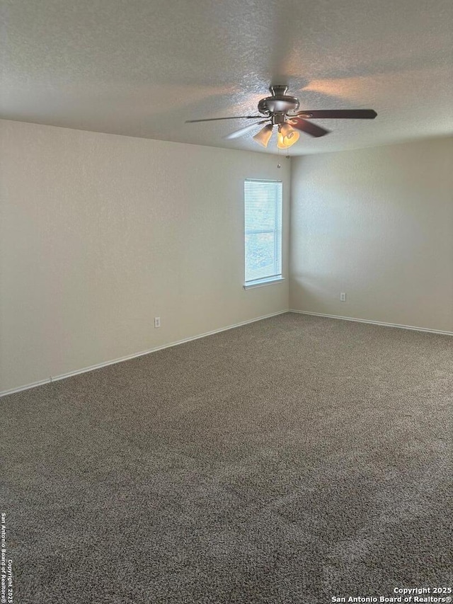 1230 Range Fld, San Antonio, TX 78245 - empty room featuring a textured ceiling, carpet floors, a ceiling fan, and baseboards