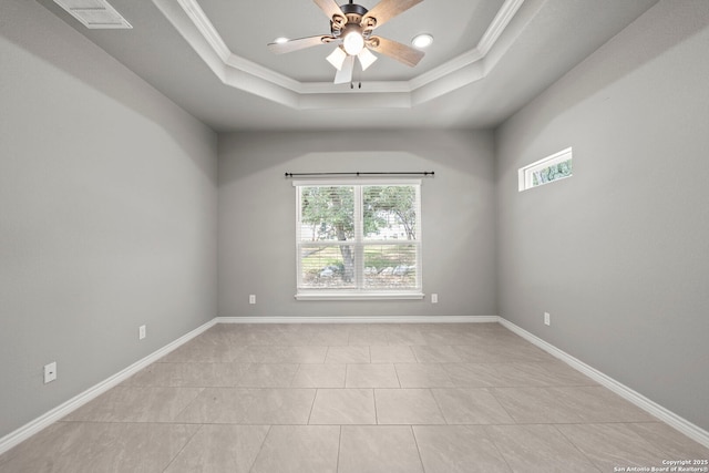 546 Indian Scout, Spring Branch, TX 78070 - empty room featuring a tray ceiling, ceiling fan, crown molding, light tile patterned floors, and baseboards