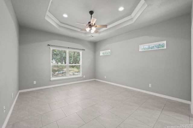 546 Indian Scout, Spring Branch, TX 78070 - empty room featuring healthy amount of natural light, ceiling fan, a raised ceiling, ornamental molding, and light tile patterned floors