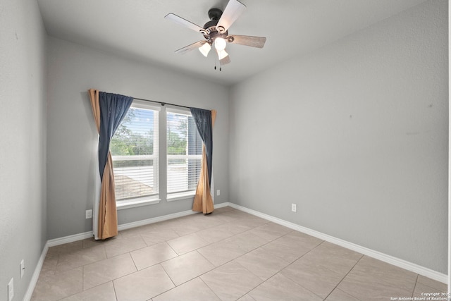 546 Indian Scout, Spring Branch, TX 78070 - unfurnished room featuring ceiling fan, baseboards, and light tile patterned floors