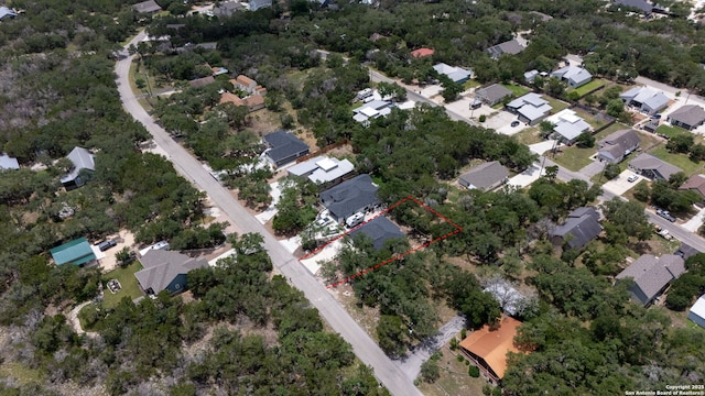 546 Indian Scout, Spring Branch, TX 78070 - aerial perspective of suburban area featuring property parcel outlined