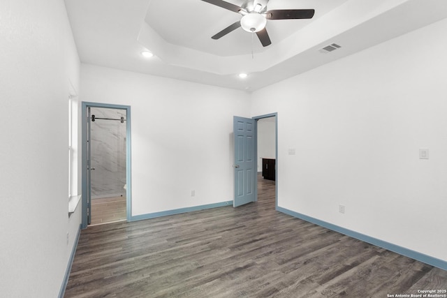 241 Hawthorne, San Antonio, TX 78214 - spare room with wood finished floors, ceiling fan, recessed lighting, baseboards, and a raised ceiling