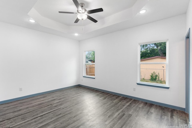 241 Hawthorne, San Antonio, TX 78214 - empty room with a raised ceiling, healthy amount of natural light, wood finished floors, ceiling fan, and recessed lighting
